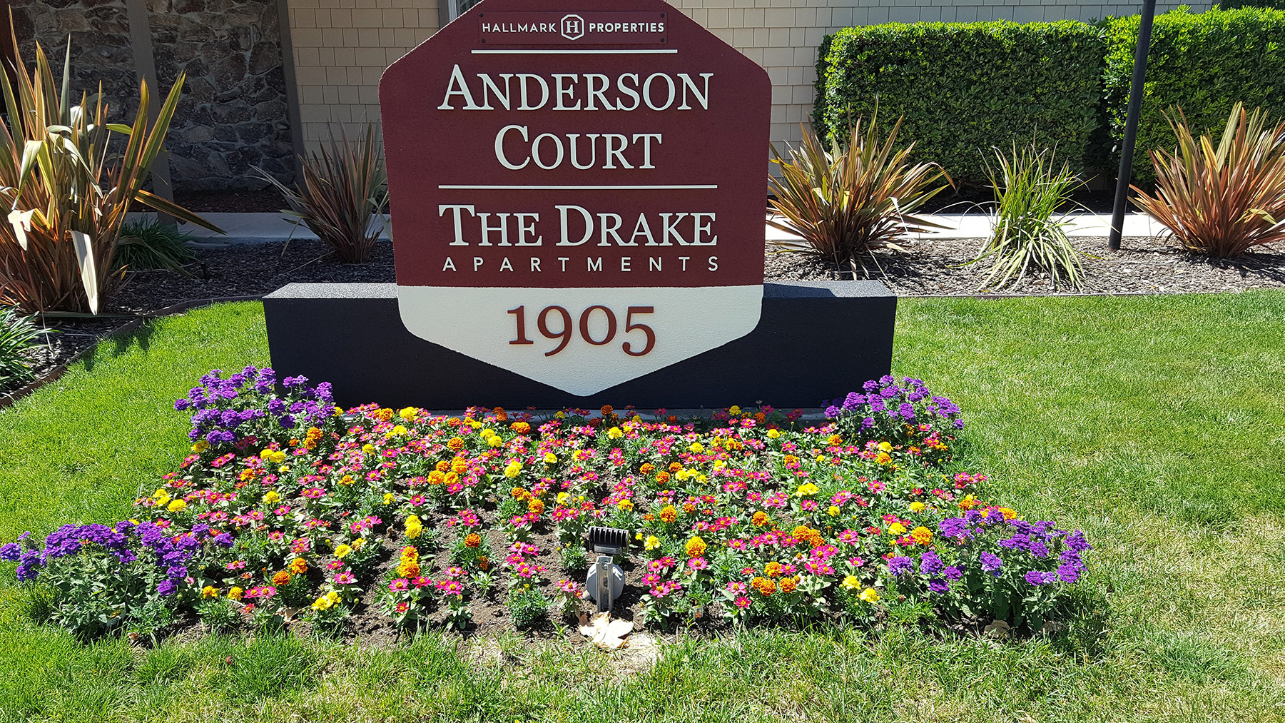 front view of apartments with sign